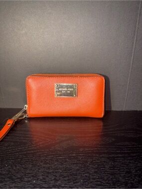 Michael Kors Orange Saffiano Zip Wristlet